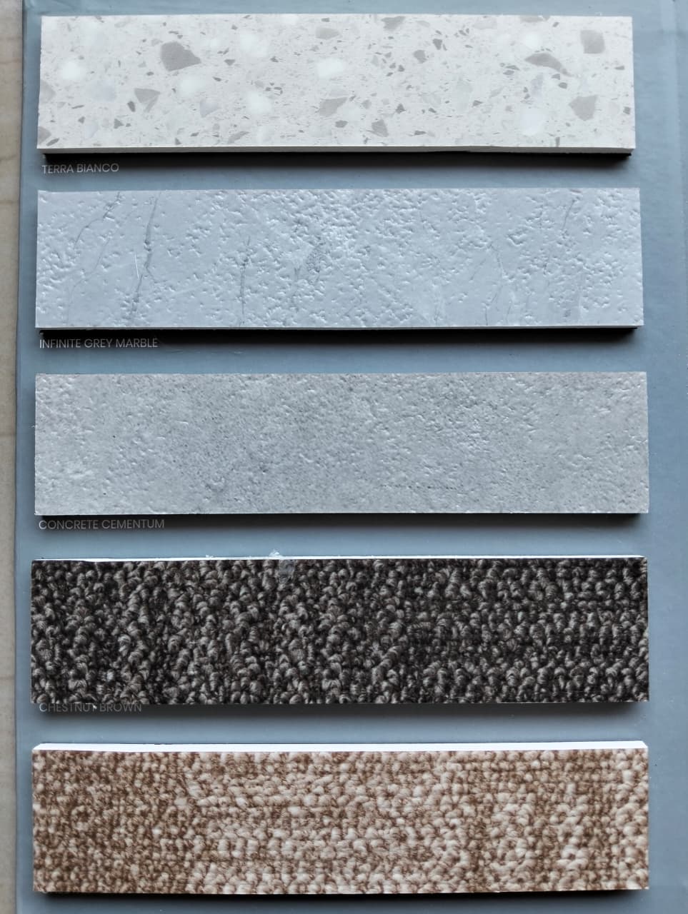 SPC Roshan Bali - Terra Bianco, Infinite Grey Marble, Concrete Cementum, Chestnut Brown & Beige - PT. Duo Indo Raya